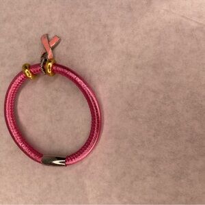 Pink Charm Bracelet with Gold Accents and magnetic closure.